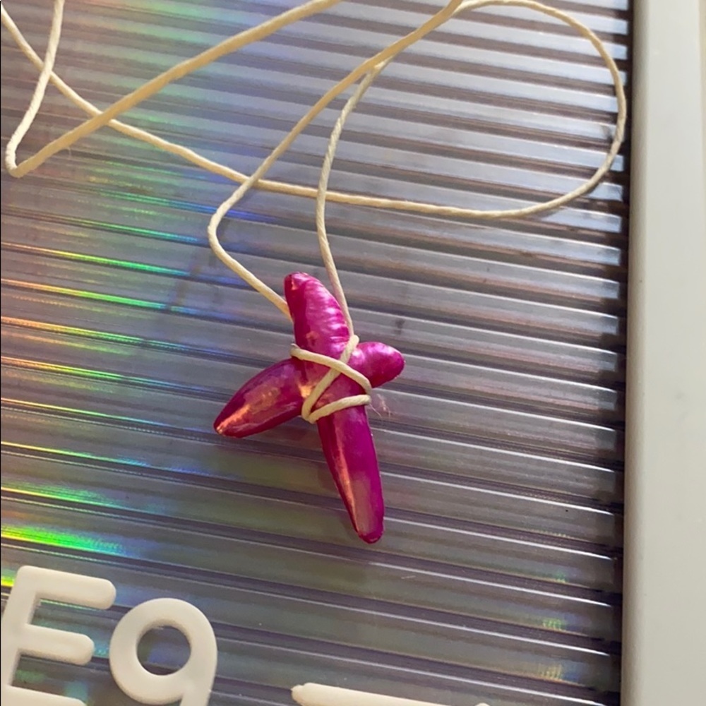 22inch hot pink pearl cross necklace.